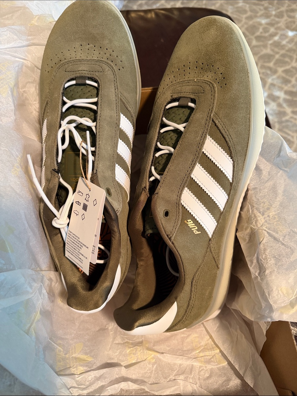 NWT and Box, Adidas Men’s Olive Suede Sneakers with White Stripes